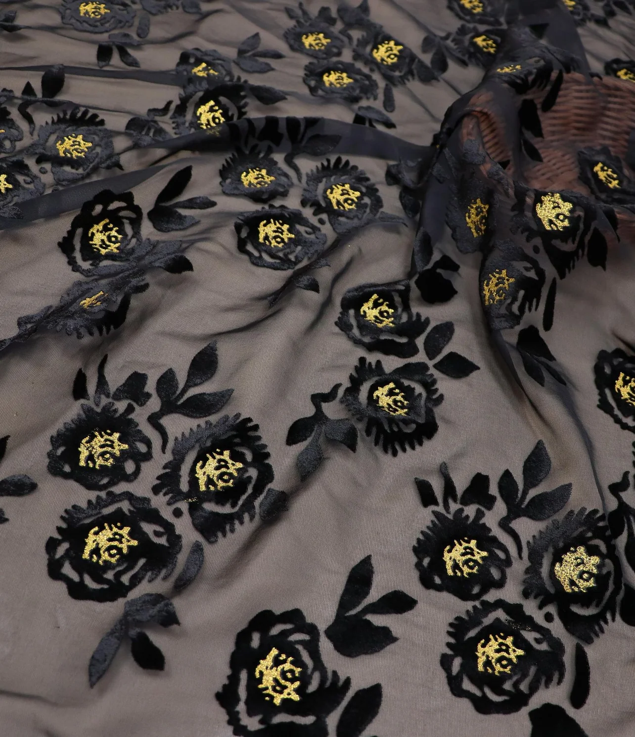 burnout velvet black rose with gold center on taupe